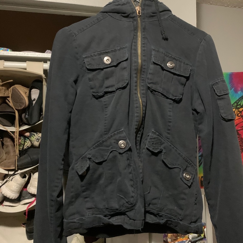 Distressed black zip up jean jacket